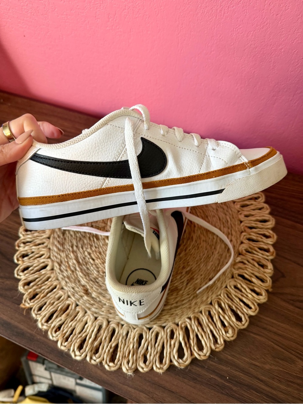 Nike White Low-Top Sneakers with Black Swoosh and Tan Accent